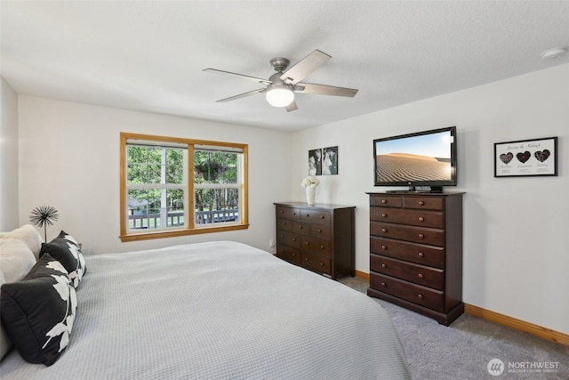 15513 NE Beebe Rd, Battle Ground, WA 98604 - bedroom featuring carpet floors, ceiling fan, and baseboards