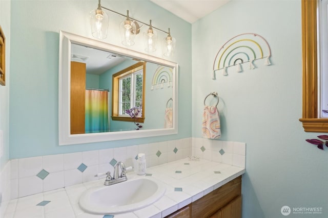 15513 NE Beebe Rd, Battle Ground, WA 98604 - bathroom with vanity and decorative backsplash