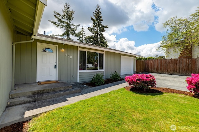 view of front of home featuring an attached garage and driveway