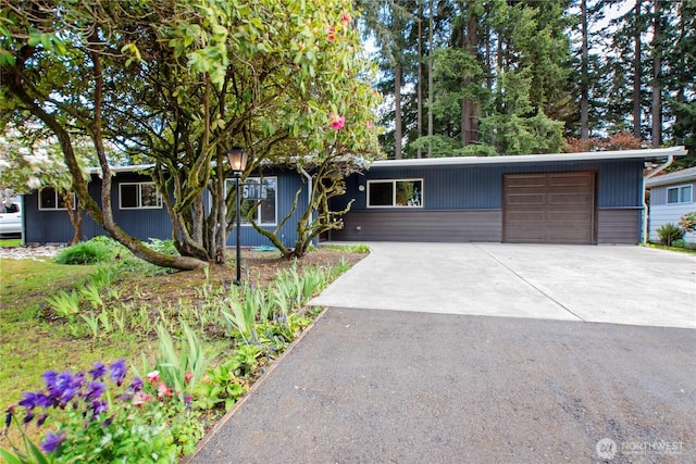 5015 15th Ave SE, Lacey, WA 98503 - view of front of house with driveway and a garage