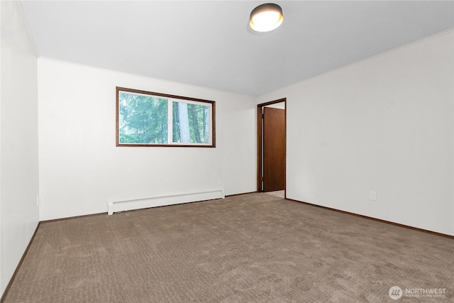 5015 15th Ave SE, Lacey, WA 98503 - carpeted empty room featuring a baseboard radiator, baseboards, and ornamental molding