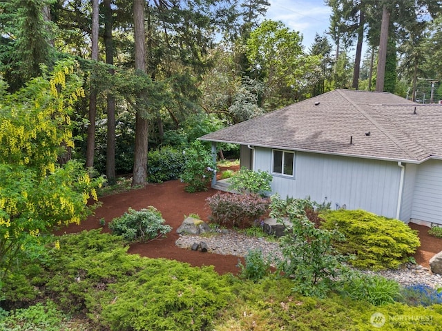 13008 65th Avenue Ct SW, Lakewood, WA 98499 - view of side of property with roof with shingles
