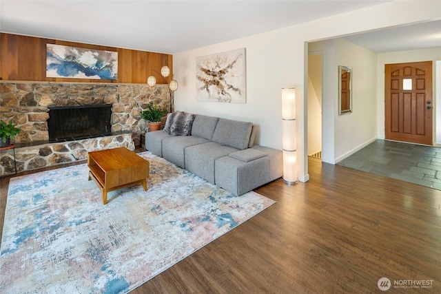 13235 68th Pl NE, Kirkland, WA 98034 - living area featuring wood finished floors, a stone fireplace, and baseboards