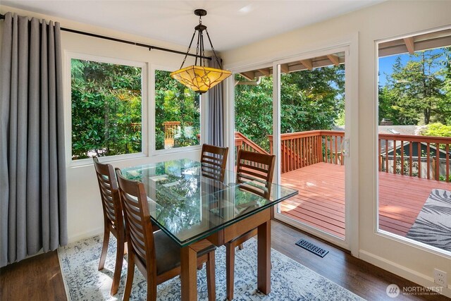 13235 68th Pl NE, Kirkland, WA 98034 - dining space featuring wood finished floors, healthy amount of natural light, and baseboards