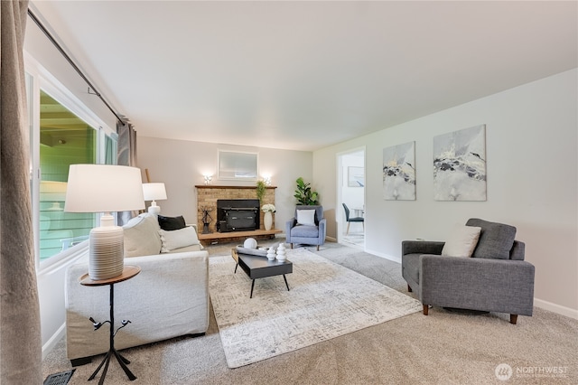 5915 148th Pl SW, Edmonds, WA 98026 - living room with carpet flooring, a stone fireplace, and baseboards