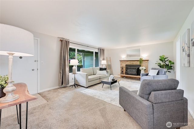 5915 148th Pl SW, Edmonds, WA 98026 - living area featuring light carpet, a fireplace with raised hearth, and baseboards