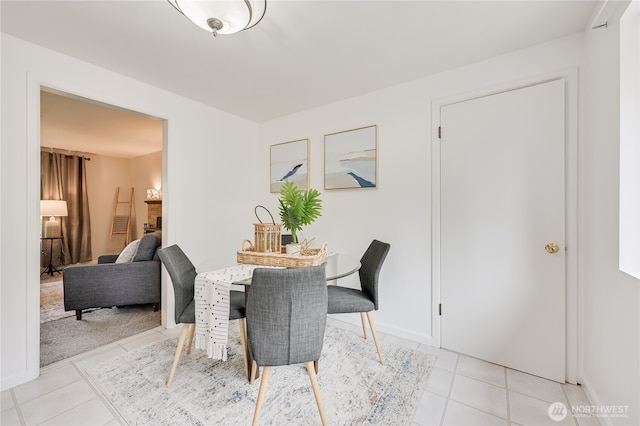 5915 148th Pl SW, Edmonds, WA 98026 - dining space with light tile patterned floors and baseboards