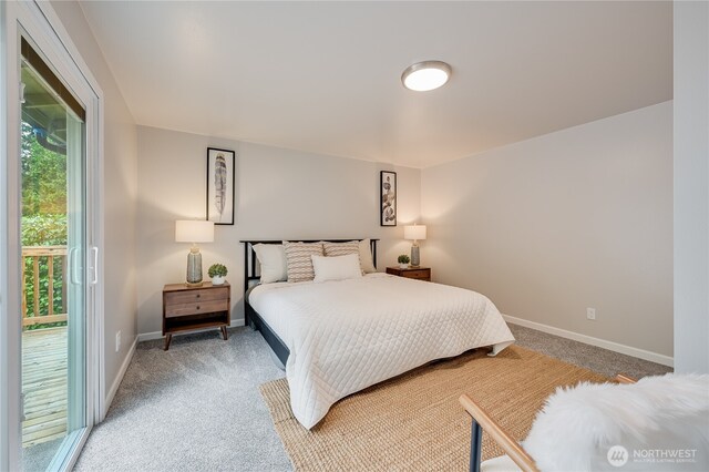 5915 148th Pl SW, Edmonds, WA 98026 - bedroom with light colored carpet, access to exterior, and baseboards