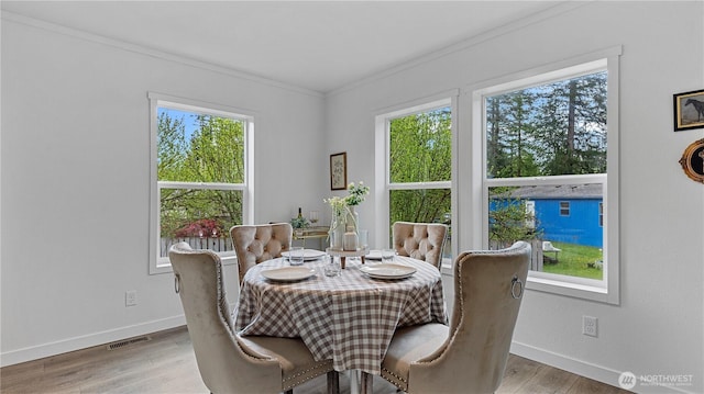 41512 Larson Dr, Gold Bar, WA 98251 - dining space featuring ornamental molding and light wood-type flooring