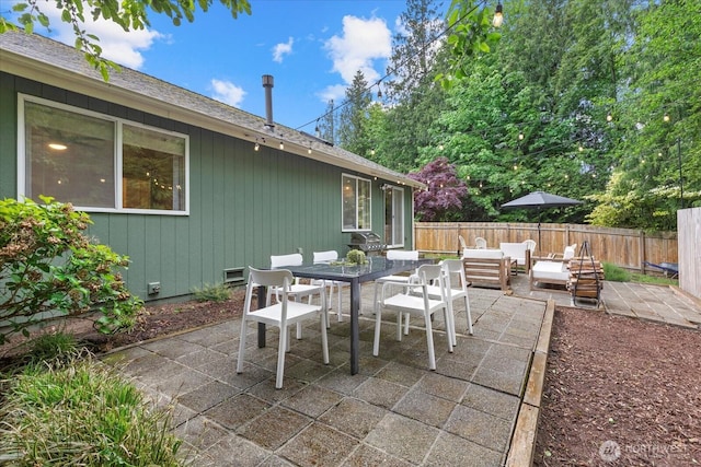 view of patio / terrace featuring an outdoor hangout area and outdoor dining area