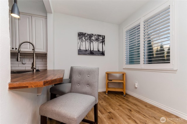 13000 Admiralty Way Unit K103, Everett, WA 98204 - living area with light wood finished floors and baseboards