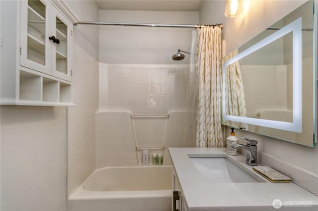 13000 Admiralty Way Unit K103, Everett, WA 98204 - bathroom featuring vanity and shower / bathtub combination with curtain