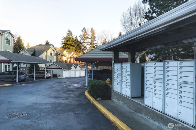 13000 Admiralty Way Unit K103, Everett, WA 98204 - view of property's community featuring mail area, covered parking, and a residential view