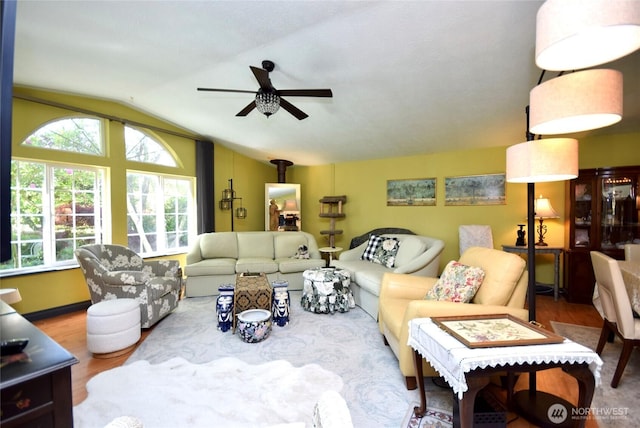171 Foxtail Ln, Sequim, WA 98382 - living area with vaulted ceiling, a ceiling fan, and wood finished floors