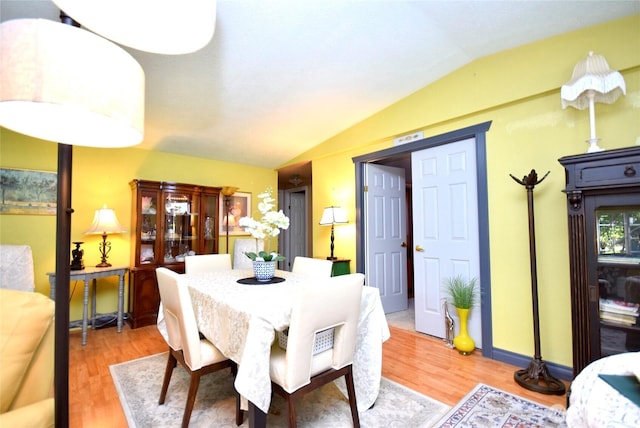 171 Foxtail Ln, Sequim, WA 98382 - dining room with vaulted ceiling and light wood-type flooring