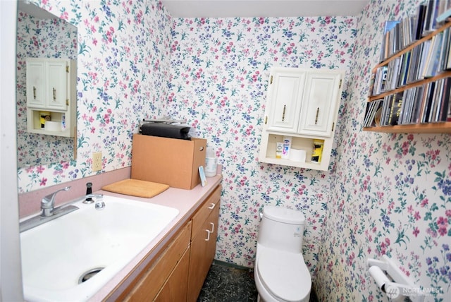 171 Foxtail Ln, Sequim, WA 98382 - half bath featuring wallpapered walls, toilet, and vanity