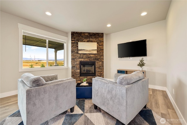470 S Partridge Ln, East Wenatchee, WA 98802 - living area featuring baseboards, a fireplace, wood finished floors, and recessed lighting