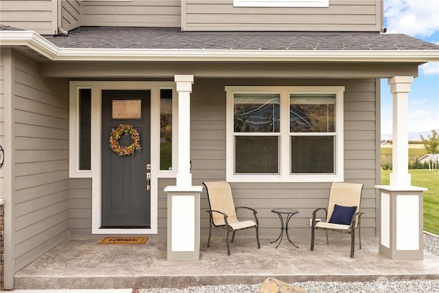 470 S Partridge Ln, East Wenatchee, WA 98802 - doorway to property featuring roof with shingles and a porch