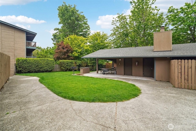 13558 37th Ave S Unit 21, Tukwila, WA 98168 - view of yard with a patio