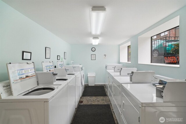 13558 37th Ave S Unit 21, Tukwila, WA 98168 - shared laundry room featuring independent washer and dryer and baseboards