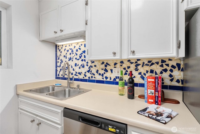 8309 Cirque Dr W Unit 4, University Place, WA 98467 - kitchen with a sink, stainless steel dishwasher, white cabinetry, backsplash, and light countertops