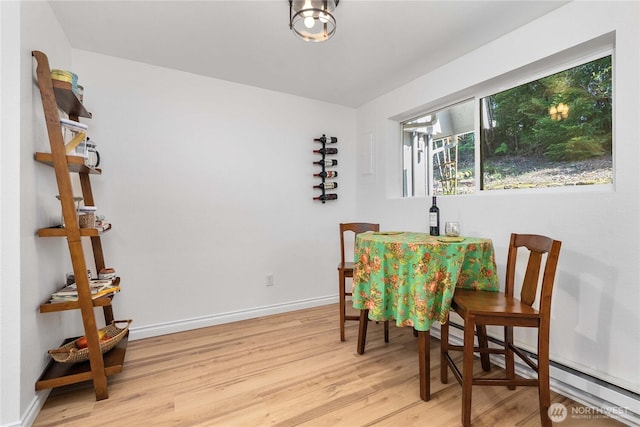 8309 Cirque Dr W Unit 4, University Place, WA 98467 - dining room with wood finished floors and baseboards