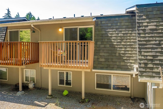 8309 Cirque Dr W Unit 4, University Place, WA 98467 - back of house featuring stucco siding and a deck