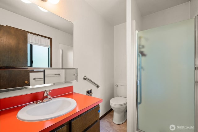 2431 W Lynnwood Dr, Longview, WA 98632 - full bathroom featuring a shower stall, vanity, and toilet