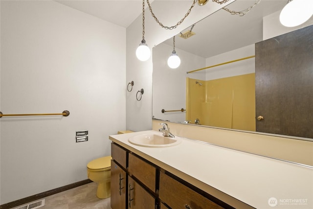 2431 W Lynnwood Dr, Longview, WA 98632 - bathroom with toilet, vanity, a shower, and baseboards