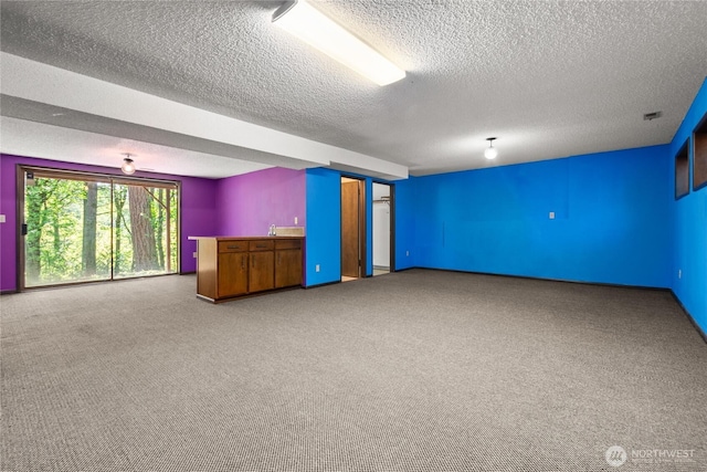 2431 W Lynnwood Dr, Longview, WA 98632 - spare room with carpet and a textured ceiling