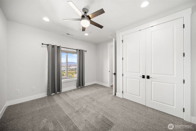 2876 N Brysen Dr, East Wenatchee, WA 98802 - unfurnished bedroom with baseboards, carpet flooring, recessed lighting, a closet, and ceiling fan