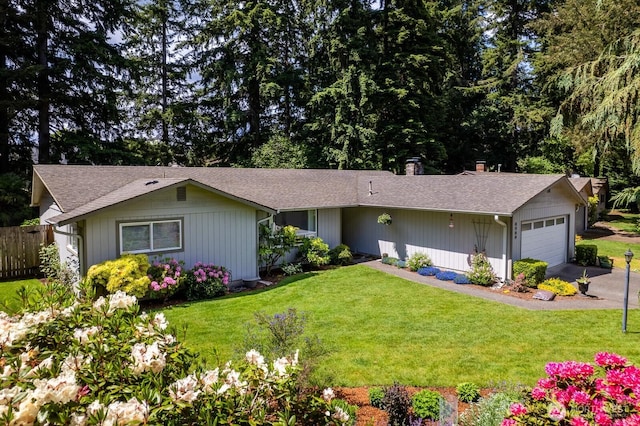 single story home featuring a garage, driveway, and roof with shingles