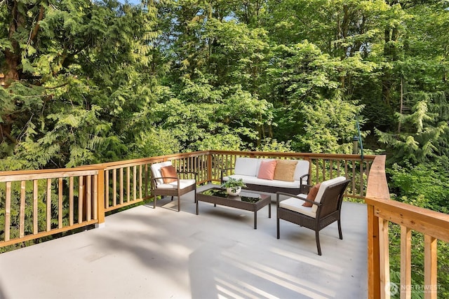 5047 84th Ave SE, Mercer Island, WA 98040 - deck featuring outdoor lounge area and a wooded view