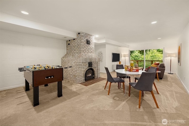 5047 84th Ave SE, Mercer Island, WA 98040 - recreation room with light colored carpet, recessed lighting, a brick fireplace, and baseboards
