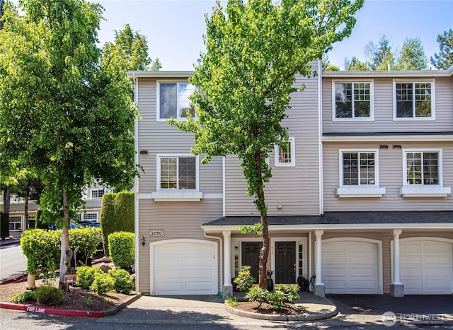 2050 132nd Ave SE Unit E-512, Bellevue, WA 98005 - townhome / multi-family property with a garage