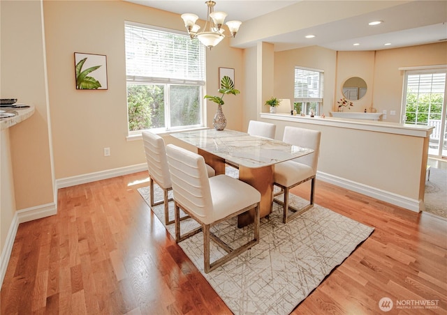 2050 132nd Ave SE Unit E-512, Bellevue, WA 98005 - dining room featuring light wood-style floors, a chandelier, baseboards, and recessed lighting