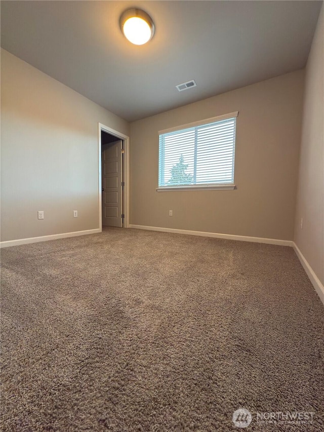18002 38th Avenue Ct E, Tacoma, WA 98446 - spare room with baseboards and carpet