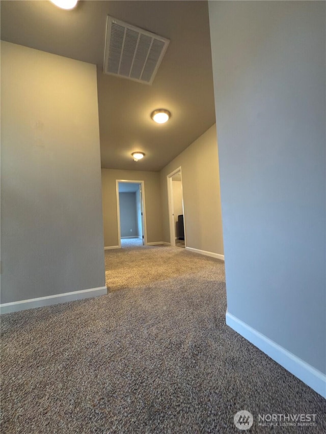18002 38th Avenue Ct E, Tacoma, WA 98446 - carpeted spare room featuring baseboards