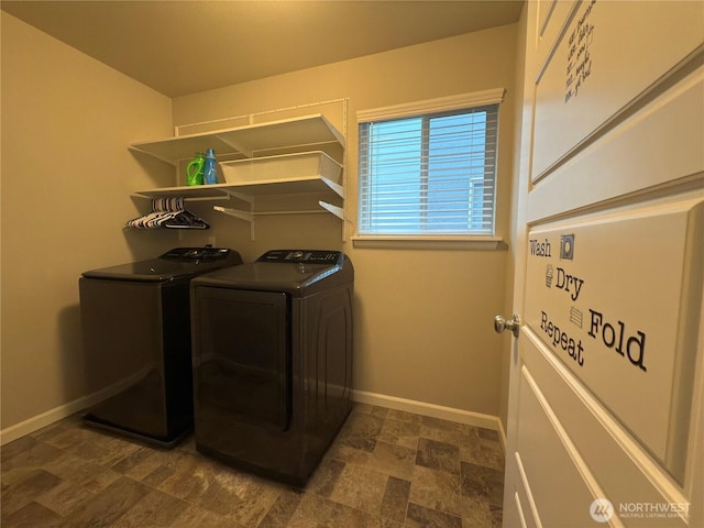 18002 38th Avenue Ct E, Tacoma, WA 98446 - laundry room featuring washer and dryer, baseboards, and dark stone finish floors
