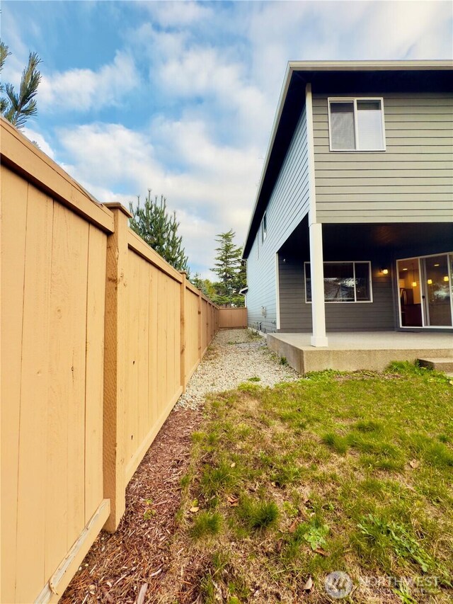 18002 38th Avenue Ct E, Tacoma, WA 98446 - rear view of property featuring a patio