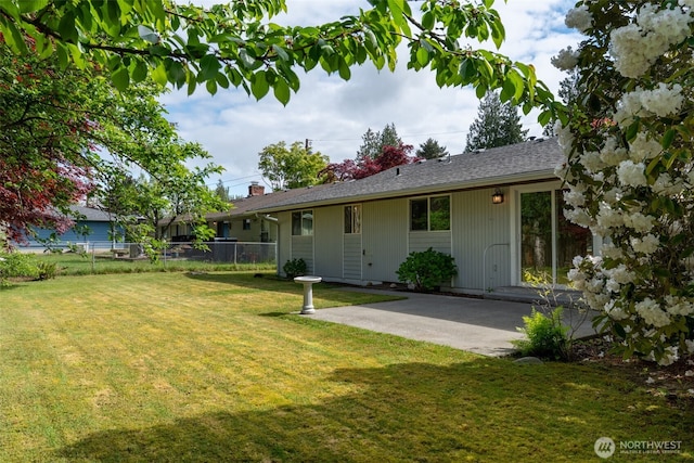 back of house with a patio area