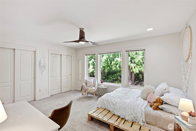 7340 Hawkstone Ave SW, Port Orchard, WA 98367 - carpeted bedroom with two closets, a ceiling fan, and recessed lighting