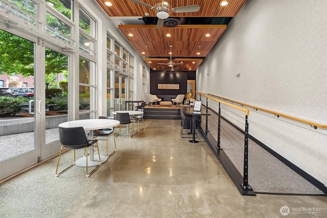 lobby featuring wood ceiling and recessed lighting