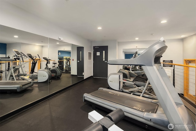 workout area featuring recessed lighting