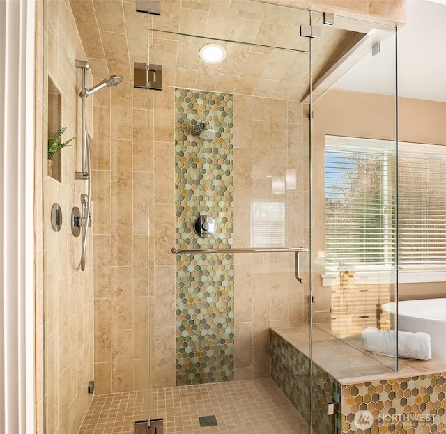 bathroom featuring a stall shower