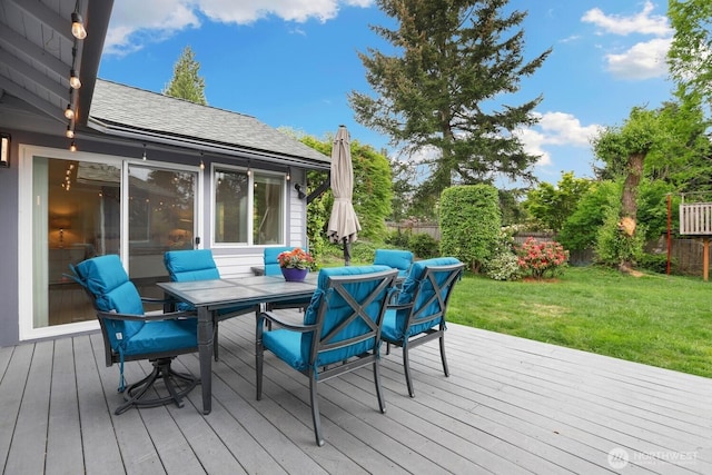 wooden deck with outdoor dining area