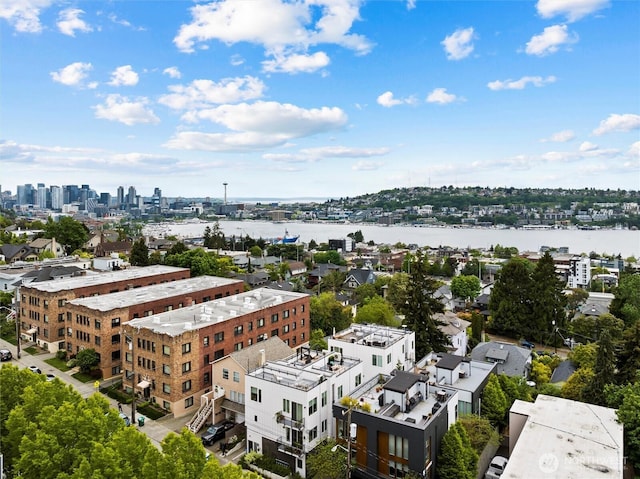 view of urban area with a nearby body of water