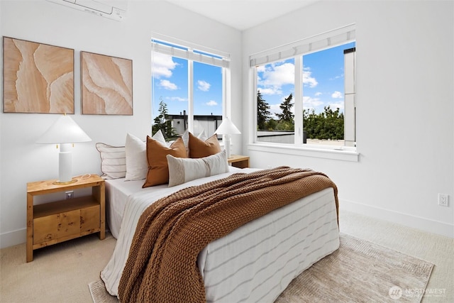 carpeted bedroom with baseboards