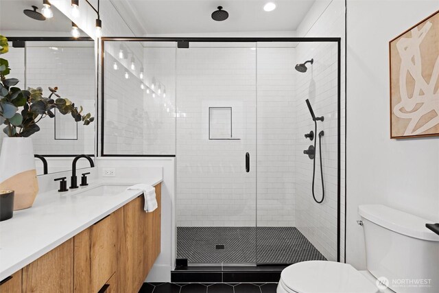 full bath featuring toilet, a shower stall, vanity, tile patterned floors, and recessed lighting
