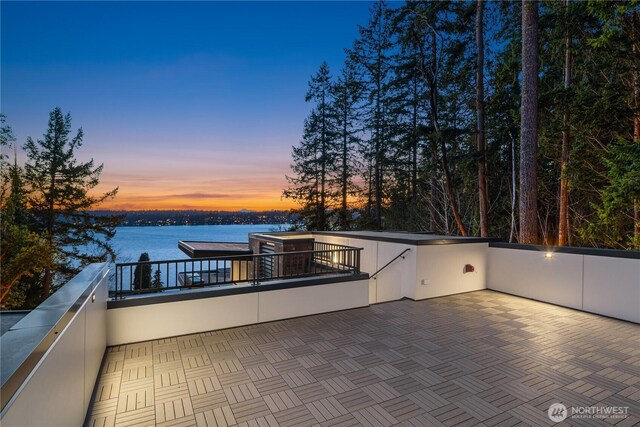 7128 NE 119th Ln, Kirkland, WA 98034 - view of patio / terrace featuring a balcony and a water view